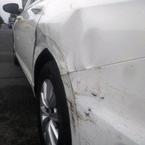 Ремонт помятого заднего крыла Volkswagen Passat